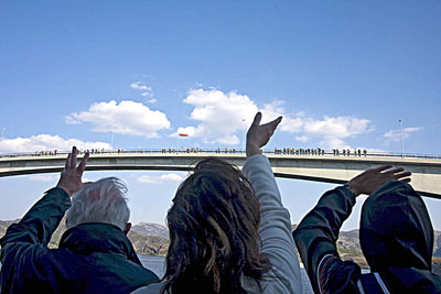 MS Trollfjord passengers wave