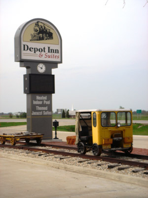 Depot Inn sign and an antique "speeder" car