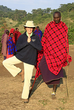 Tanzania, Diana Hunt's tree pose with Maasai