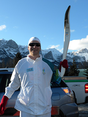 Matt Mosgeller with Olympic torch