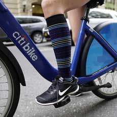 Compression socks on a bike rider