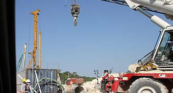 Yucatan, equipment and workers along Highway 186