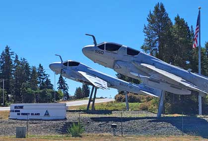 Historic planes mark the entrance to the Whidbey Island Naval Air Station.