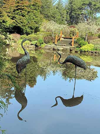 Sculptures in a water garden, Bandon, Oregon