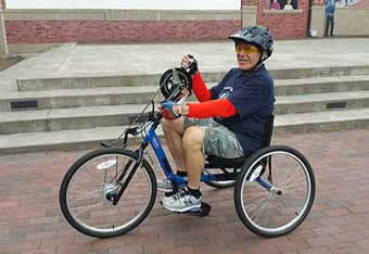 Author on hand-pedal bike