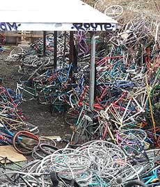 Mini-mountain of trashed bikes